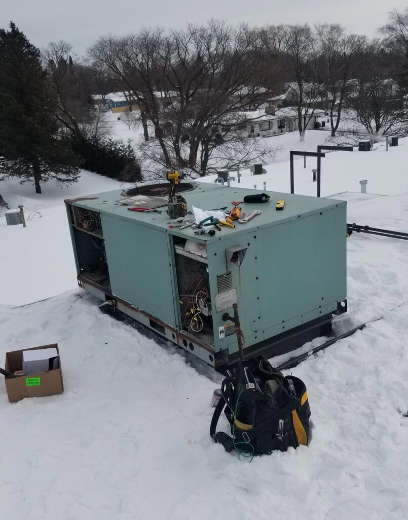 commercial HVAC repair on rooftop