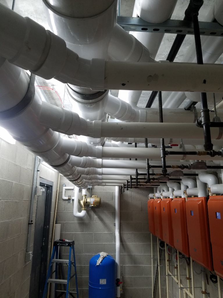 Multi family water heater room