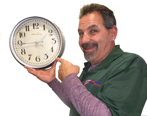 Pete with clock pete holding a clock